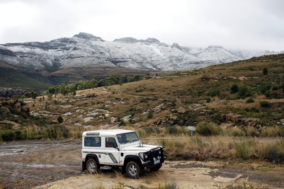 Snow landrover rocks