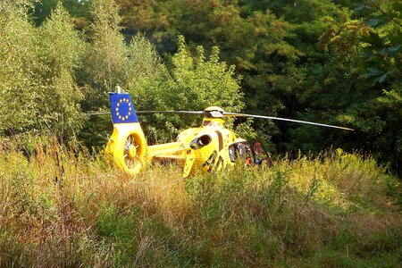 Rescue helicopter ambulance helicopter forest photo