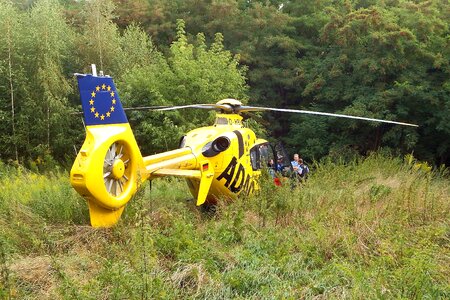 Rescue helicopter ambulance helicopter forest photo
