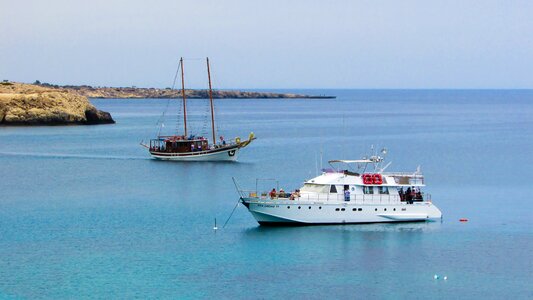 Boat seascape tourism photo