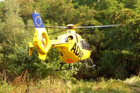 Rescue helicopter ambulance helicopter forest