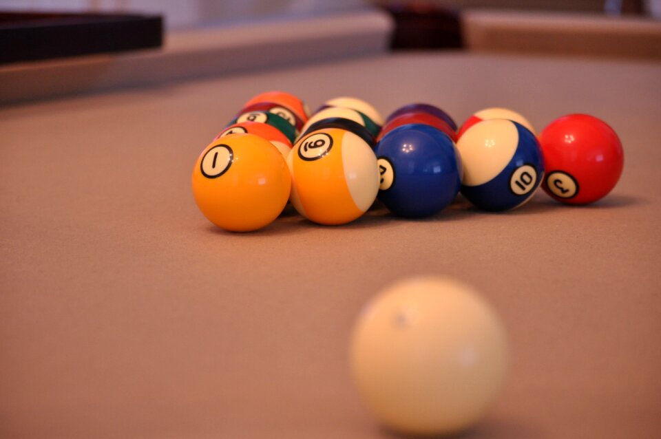Playing pool table
