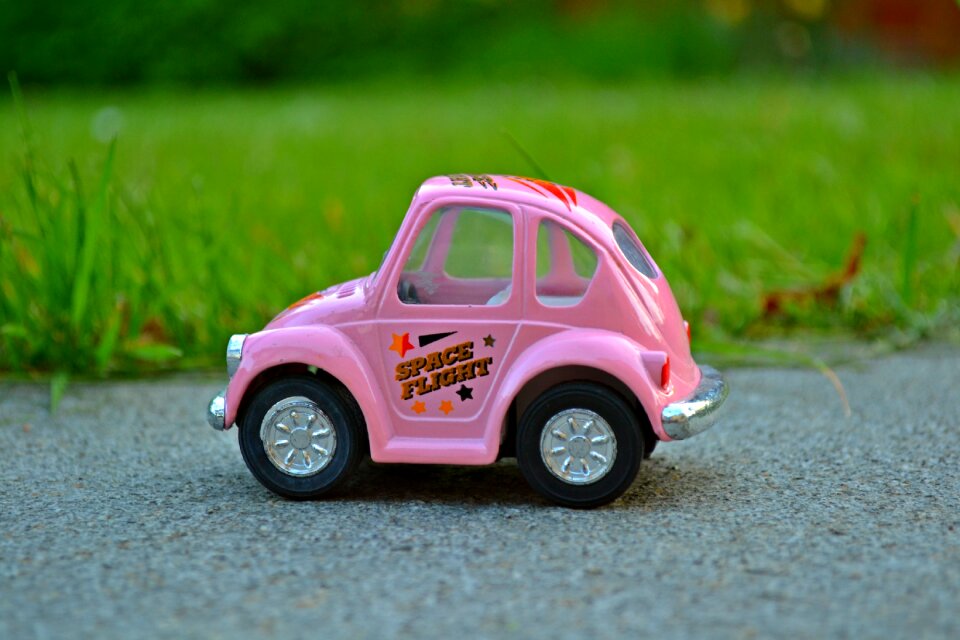 Miniature car nature green grass