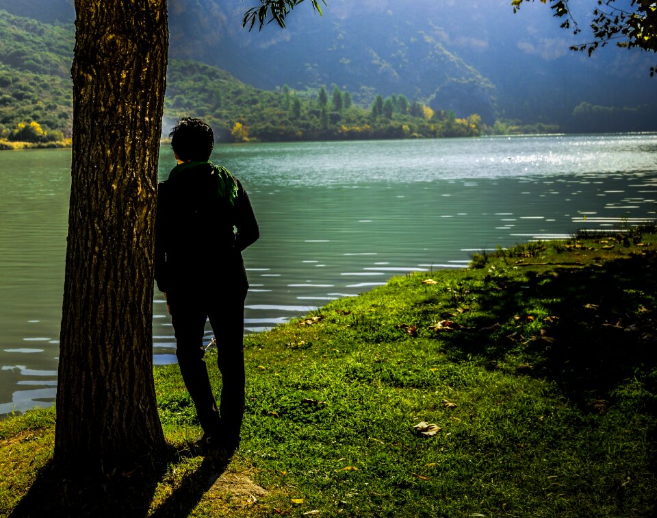 Thoughtful person lake nature
