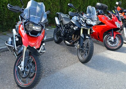 Two wheeled vehicle riding a motorcycle sporty