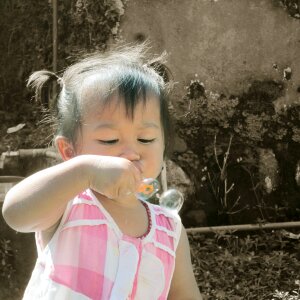 Girl asia soap bubbles photo