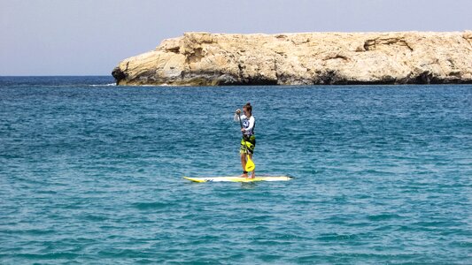 Girl paddling tourism photo