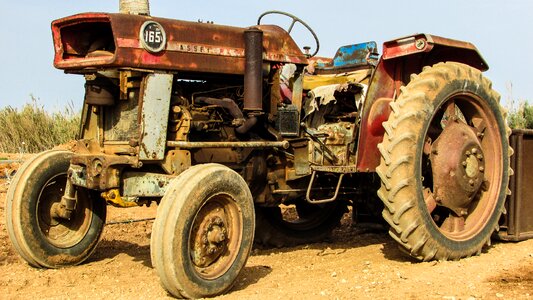 Aged agriculture machine photo