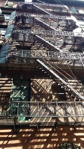 Blue historic fire escape photo