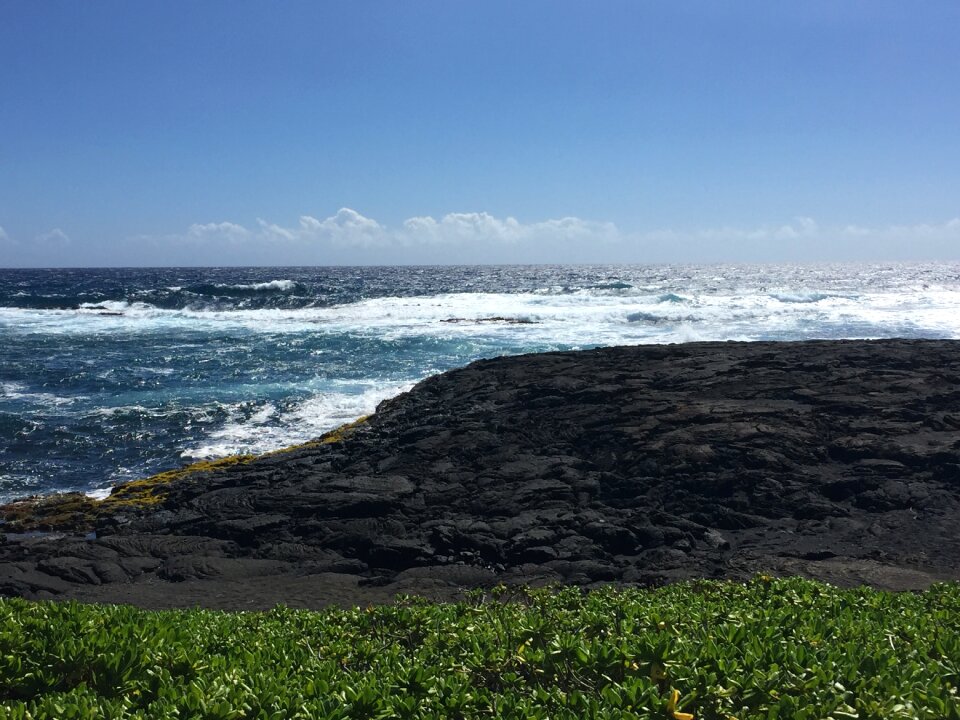 The sea black sand beach hawaii
