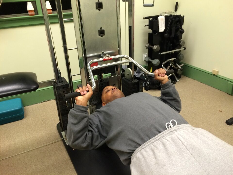 Universal machine flat bench press