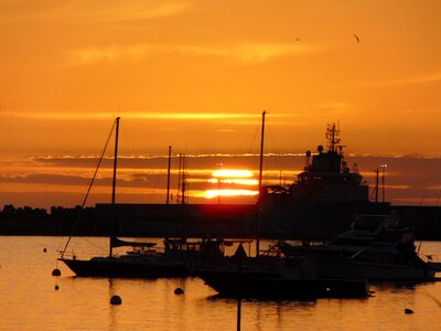 Sunset wharf ocean photo