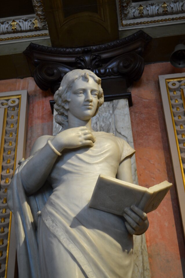 Reading marble sculpture