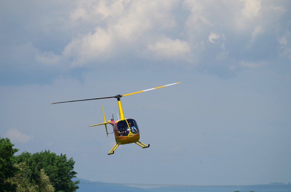 Helicopter fly the clouds