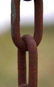 Iron links of the chain rusted