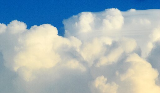 Cumulus clouds blue clouded sky photo