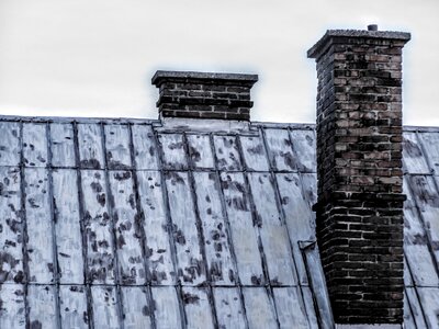 The roof of the building chimney photo