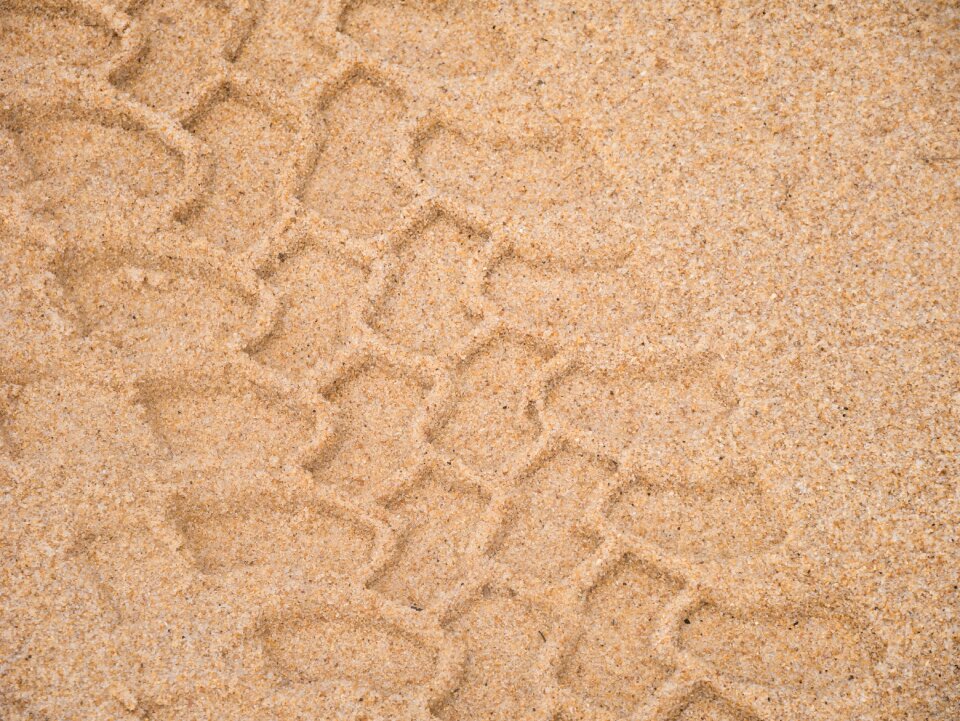 Sand tracks in the sand tire tracks
