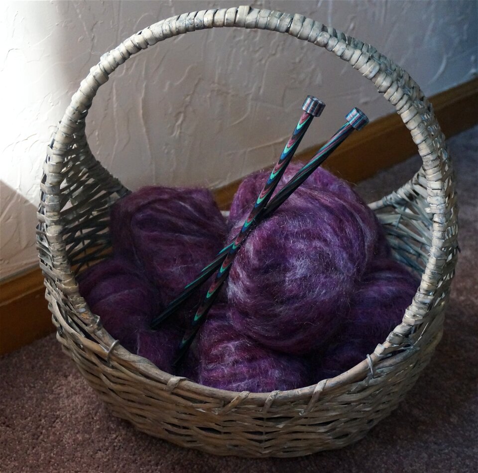 Knitting needles knitting purple