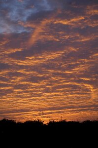 Evening orange sky clouds photo