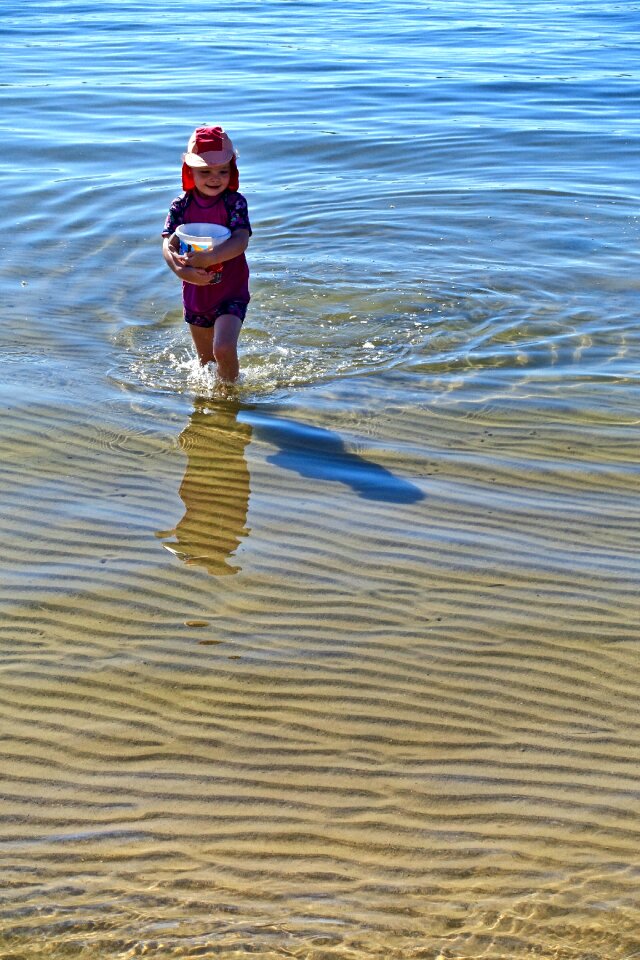 Childhood beach fun happy kid