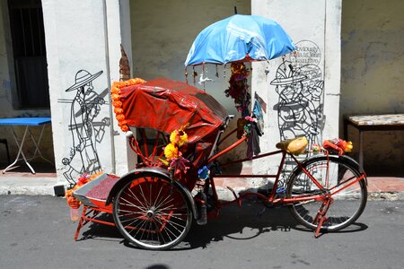 Shadows cycle rickshaw three wheeler