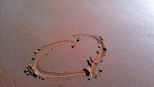 Heart sand drawing photo