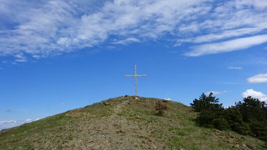 Summit cross mountains clouds photo