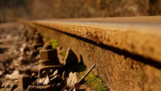 Railroad track rust wooden sleepers photo
