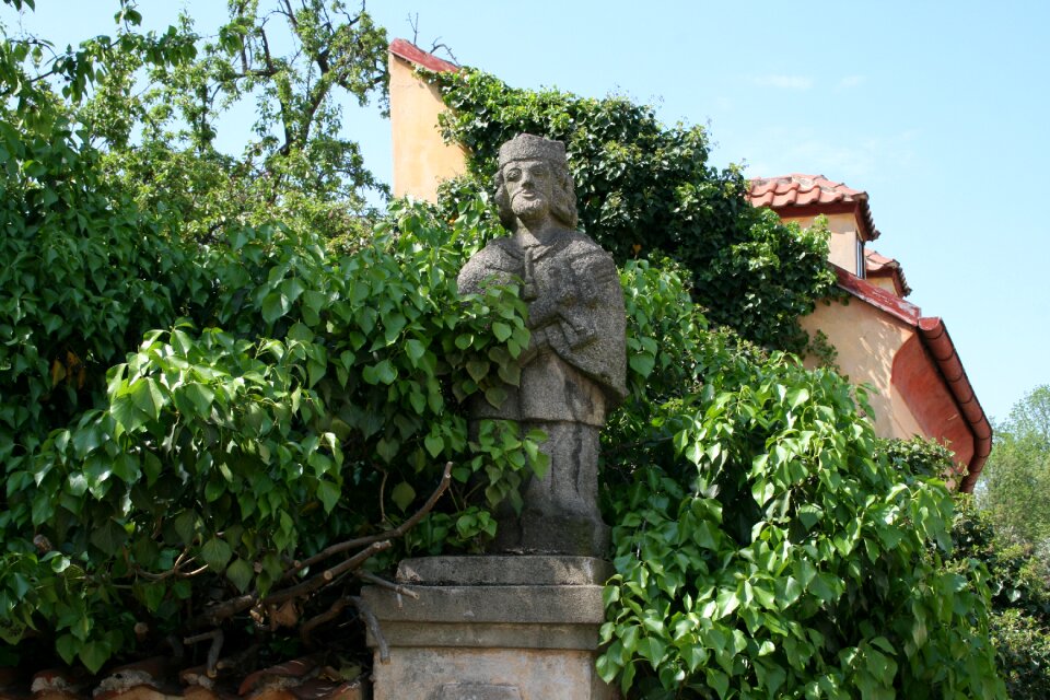 Garden sculpture stone figure tree