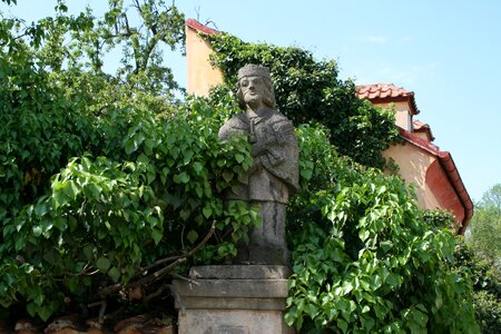 Garden sculpture stone figure tree