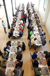 Chess congress players chess board