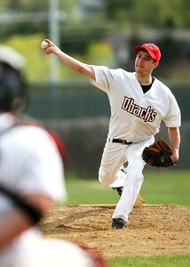 Throw pitch baseball player