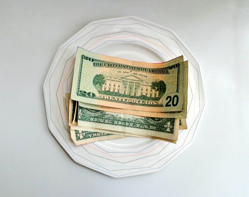 Cash plate money on a plate