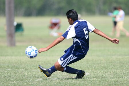 Soccer ball athlete grass photo