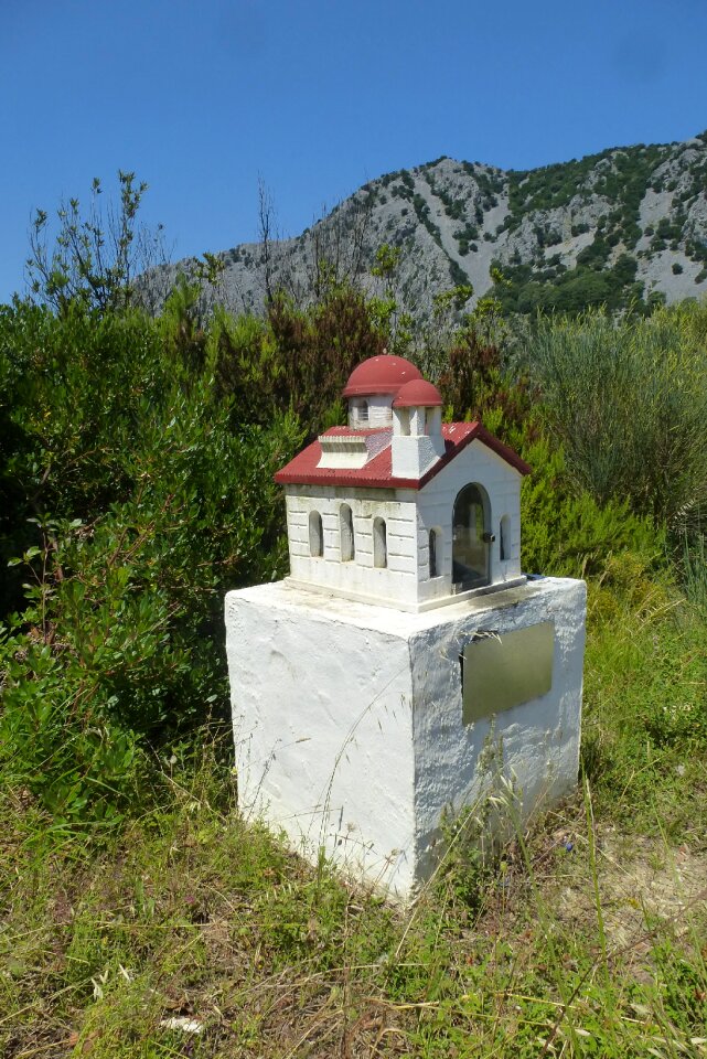 Signpost church as a lane marker greek church