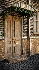 Cobblestones masonry wooden door
