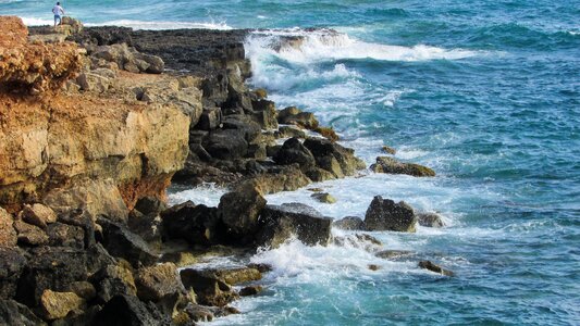 Crash sea spray rocks photo