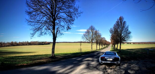 Sports car sun sky