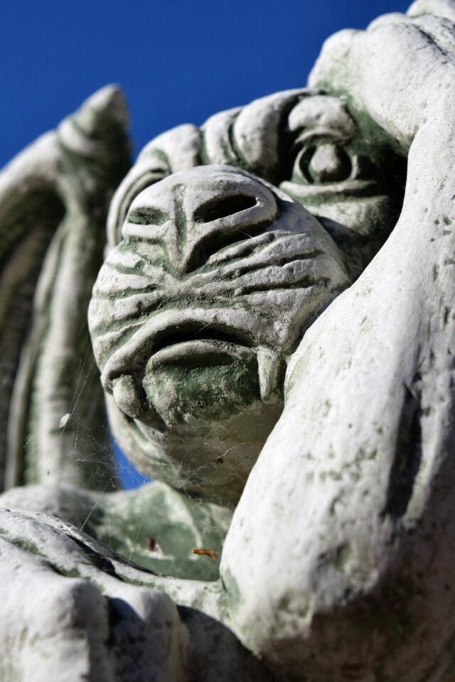Stone head stone sculpture