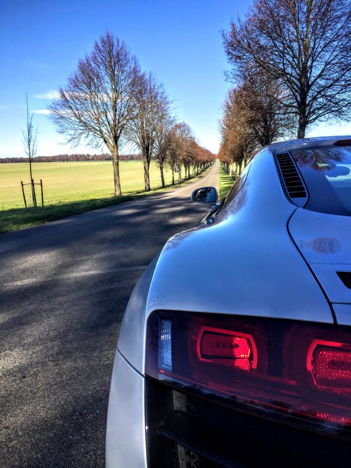Sports car sun sky