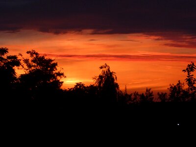 Sunset the sun clouds photo