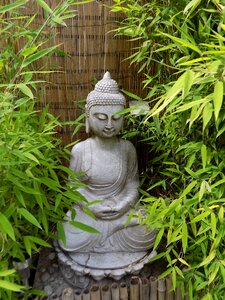 Stone figure spiritual meditation photo