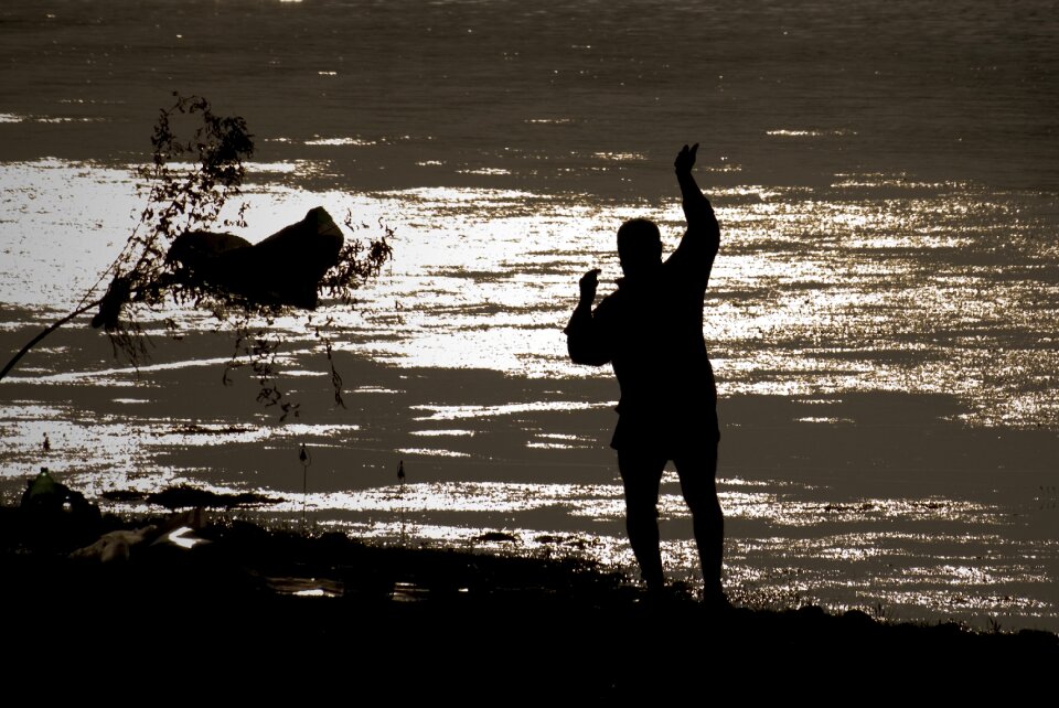 From adana fisherman silhouette
