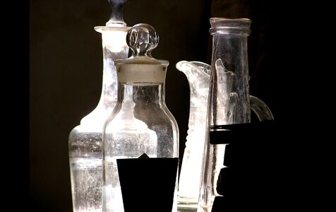 Bottles mirroring reflexes photo