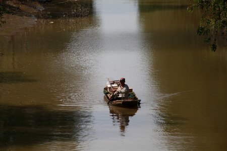 Old boat on river sail photo