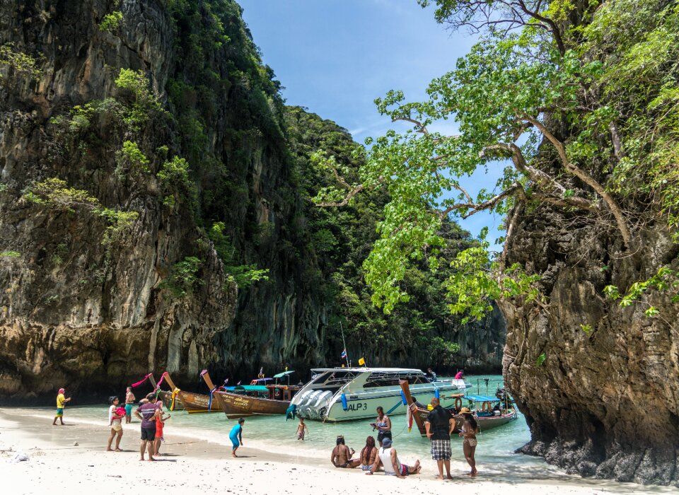 Beach people person wooden boats photo