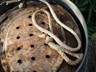 Fisherman fishing bucket