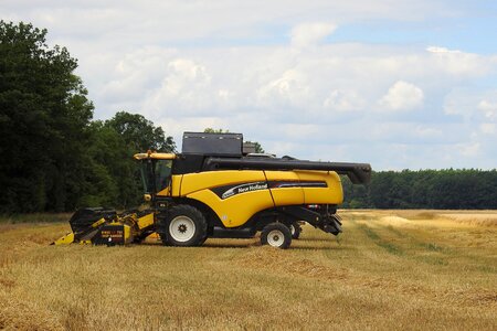 Vehicle agricultural machine grain harvest
