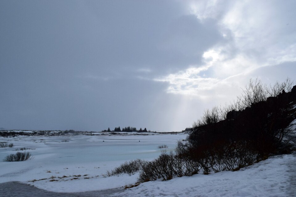 Sun breaking clouds